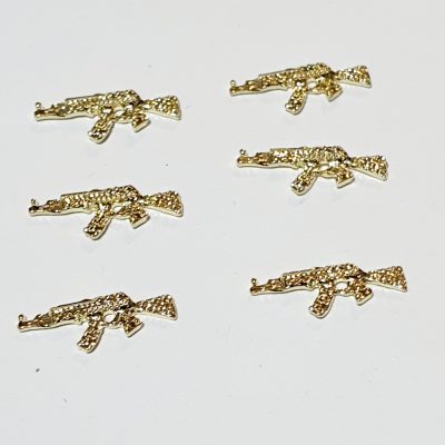 Set de dijes de mini pistola