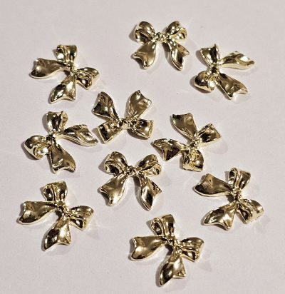 Set de moñitos dorados